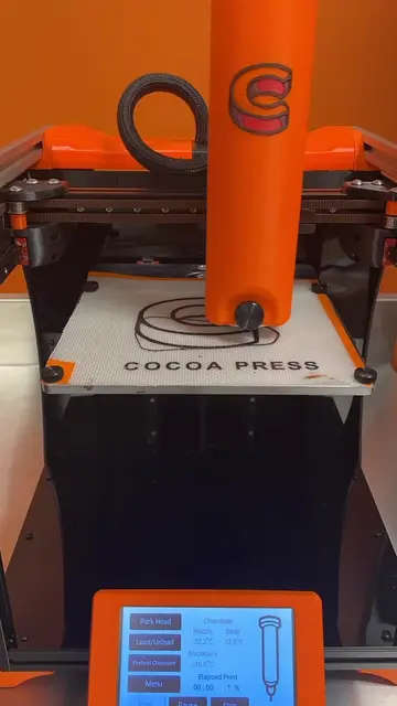 I made the world’s first articulating 3D chocolate print. This printer is gettin