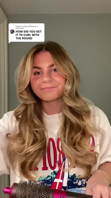 Replying to @Hope Williams how to curl your hair with the Dyson round brush atta