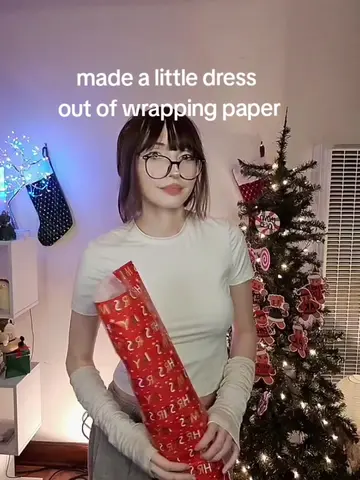 wrapping christmas present 🎅 #paperdress #unwrapme #wrappingpaperdress #christm