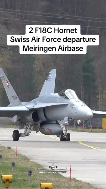 2 McDonnell Douglas F18C Hornet from the Swiss Air Force J-5009 J-5005 takeoff a