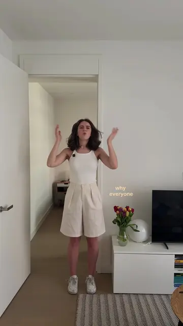 what is wrong with the first outfit? long shorts already visually shorten the le