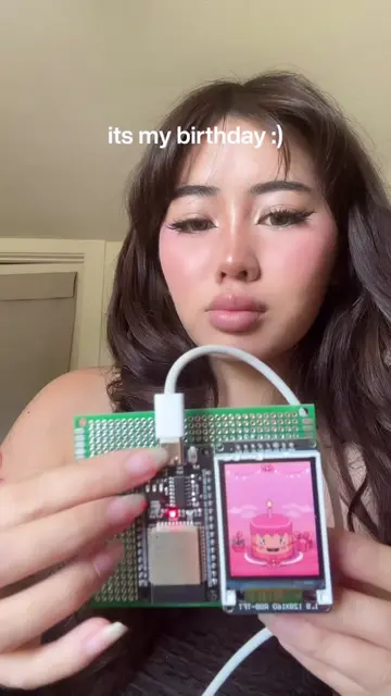 built a tiny happy birthday device with an ESP32 + custom PCB an animated birthd