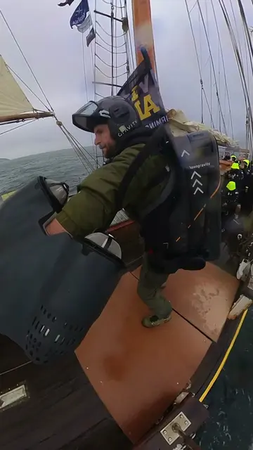 Richard Browning, Gravity CEO, going ashore with the Invictus Games flag last we