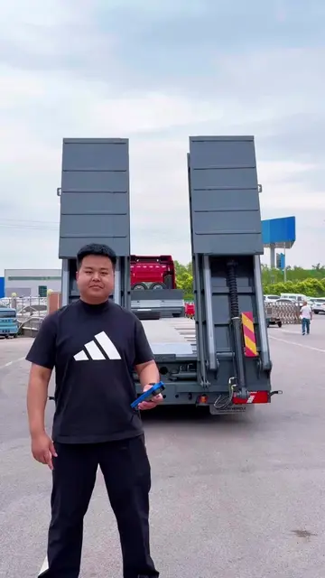 Lowbed semi-trailer equipped with hydraulic ramps, specially designed for transp