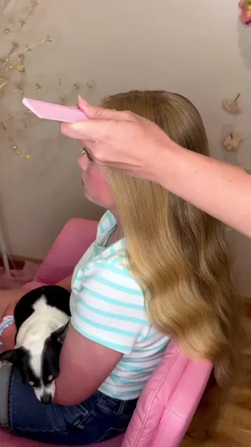 If summer were a hairstyle it would be this cute half up messy flower clip bun w