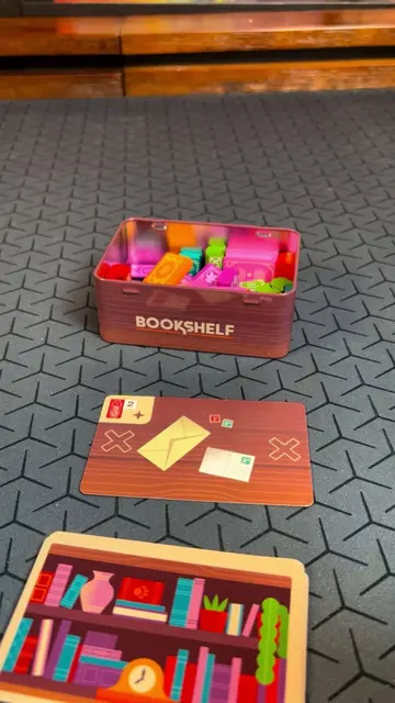 This is Bookshelf a new tiny dexterity game where you stack a bookshelf. It can 