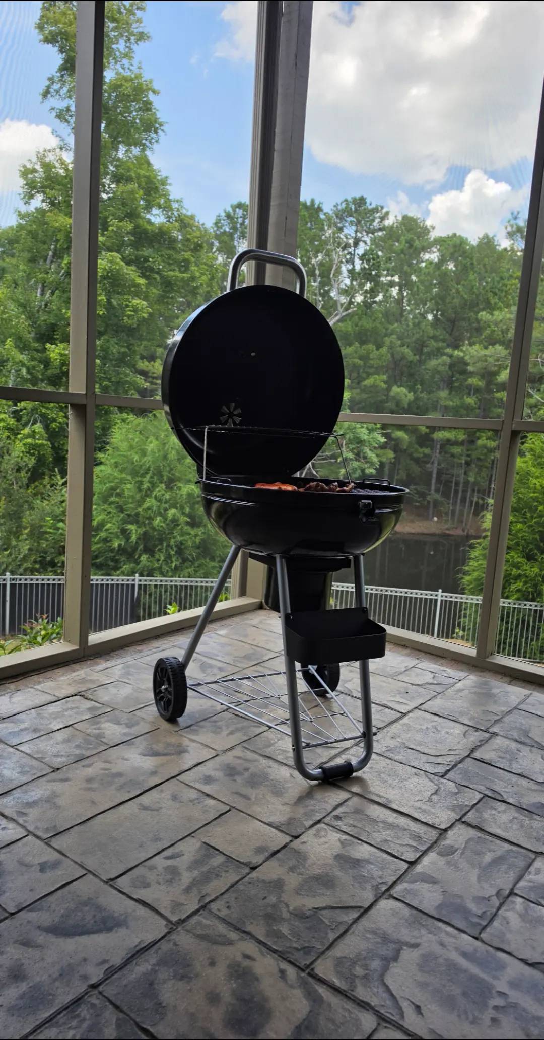 Relaxing. Feet up. Food on the grill. Glass of wine in hand.  #Sunday 