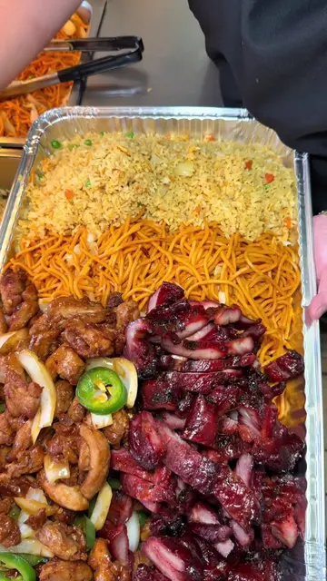 This Chinese food spot has these loaded big back family trays and the viral bbq 