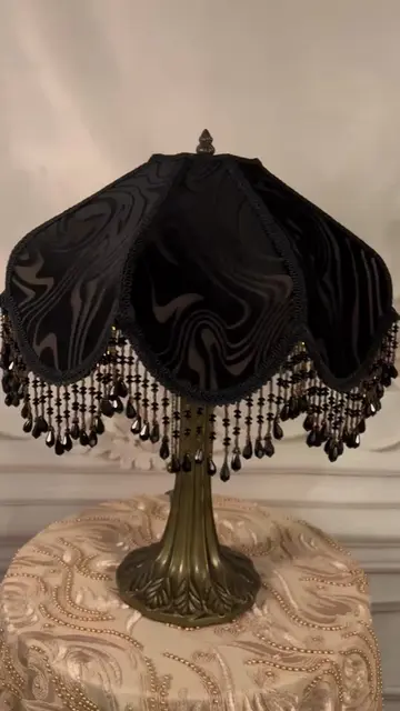 ✨ A lampshade that transforms with light. Deep black velvet by day. A warm amber