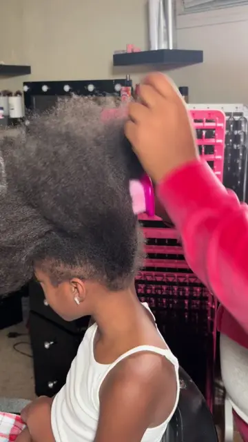 A quick natural hairstyle for my 7year old daughter. #kidshairstyles #hairtutori