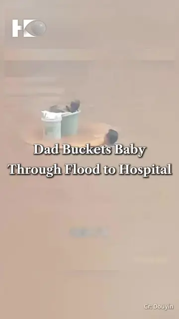 A father was filmed putting his baby in a plastic bucket balanced on a round flo
