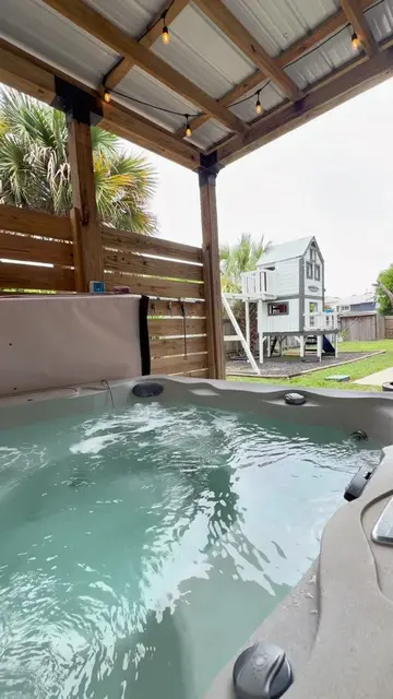 Pet friendly+ Hot Tub  This beach house in Panama City Beach is STEPS from white
