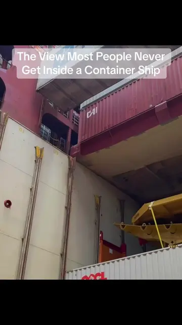 Standing inside the hold of a Post-Panamax container ship as a 40-foot container