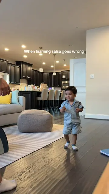 Mans learned salsa in Spanish class today, but one of us is distracted while he 