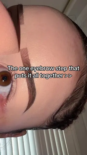 Blending out the eyebrows so it fades>> also I used concealer to carve out my ey