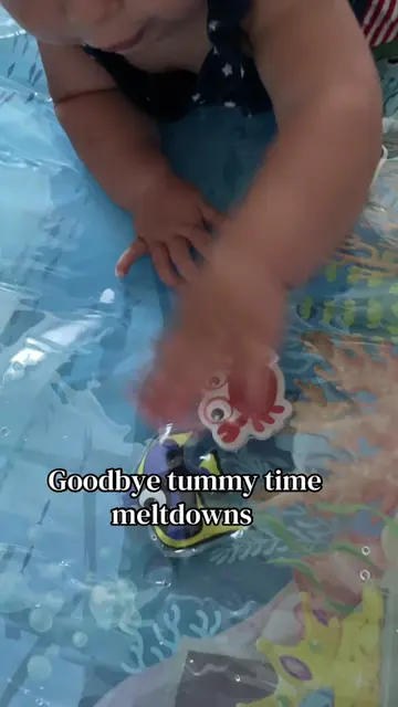 🐠 The Tummy Time Splashez mat keeps little ones engaged with colorful floating 