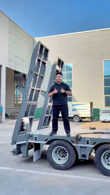Lowbed Semi Trailer, made of high-quality steel, suitable for transporting excav
