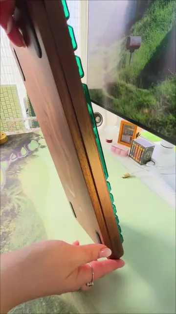 A keyboard fit for an epic fantasy adventure, this wooden keyboard is a wonderou