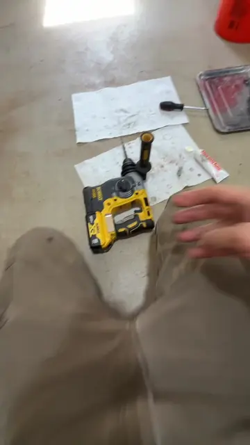 In part nine of repairing a DEWALT 20V MAX SDS Rotary Hammer Drill (DCH273B), we