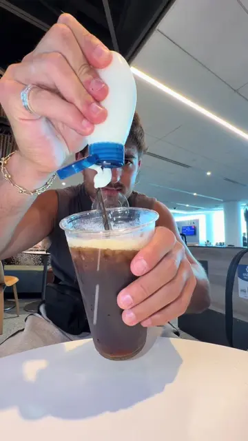 he put WHAT in his coffee?! #fyp #viral #relatable #airport #coffeeyogurt 