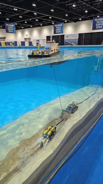 Watching this underwater ROV trench and bury a subsea power cable feels just lik