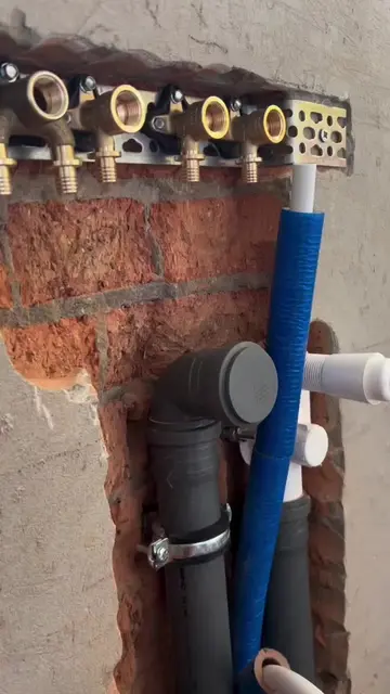 Professional in-wall installation for washing machine drain and water supply. Do