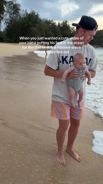 So glad Carter had a good hold of him #baby #waves #ocean #husband 