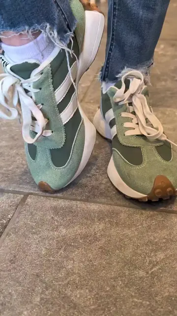 Grabbed these for Jen and she hasn't taken them off. Thick sole height boost, no