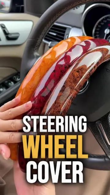 Say goodbye to uncomfortable driving! 🚗  The Cargear Steering Wheel Cover is th