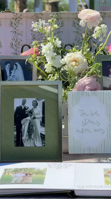 Our wedding guest book table - including photos of our parents + grandparents at