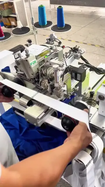 Fully automatic waistband stretching and sewing machine #Automaticbuttonmachine#