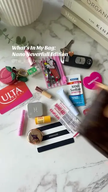 Were you surprised at how much could fit?!👀🤯 This Neverfull Nano Cardholder is