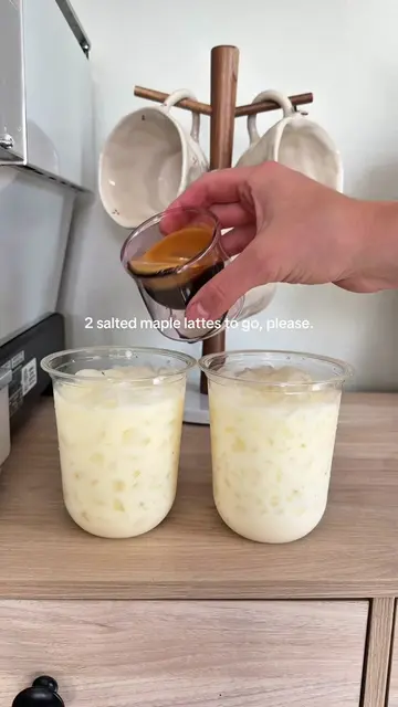 Two homemade lattes to go > coffee shop.🤎 ✨Recipe✨ - 1-2 tsp maple syrup  - pin