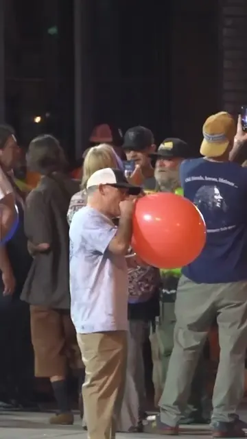 A large crowd took over a downtown LA sidewalk Thursday night — inhaling nitrous