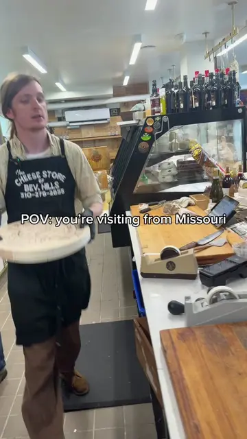 Welcome to the cheese store of Beverly Hills! We’ve got some amazing Brie de mea