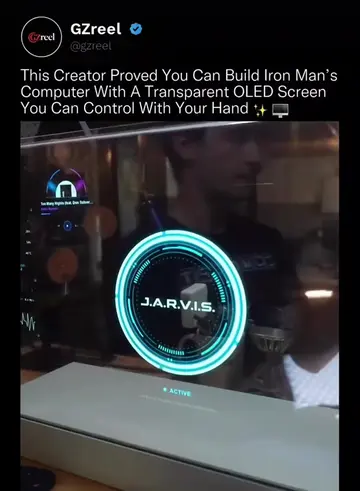 The hologram is a screen; the screen is clear glass. The floating interface runs