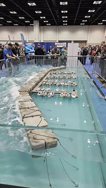 A floating breakwater protecting an entire marina! 🌊🛥️ This realistic hydrauli