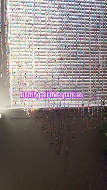 this cat doesn't touch the beaded curtain but he does love the sparkles ✨️ ♥️ 