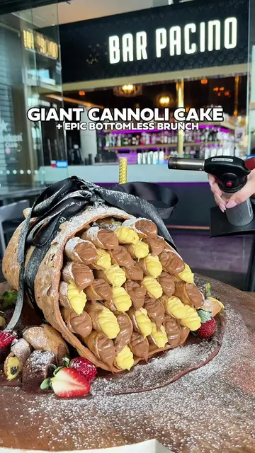 [ MUST TRY ] THIS ITALIAN BAR HAS A GIANT CANNOLI CAKE AND A $75 BOTTOMLESS BRUN