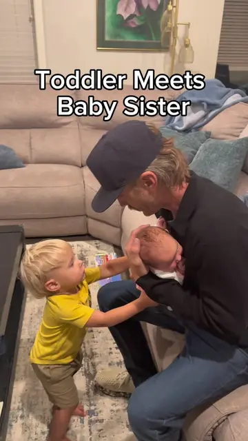 Toddler meets his baby sister for the first time. This was such a precious momen