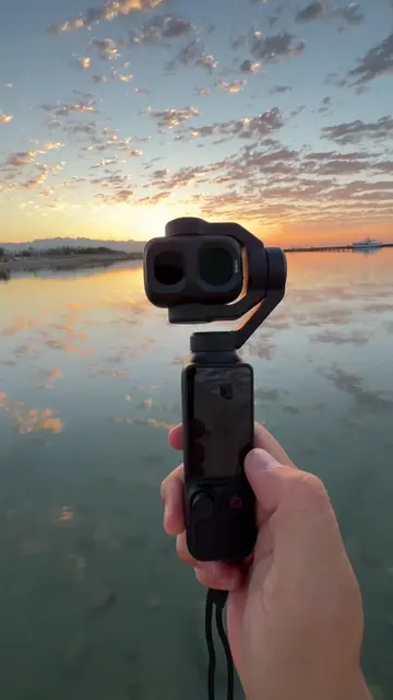 What’s waiting on the other side of the lake? 👀 With Osmo Pocket 4P’s up to 12×
