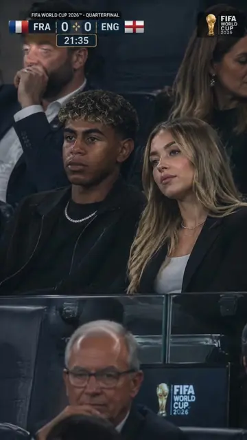 Line Yamal with his friend at the last game between France and England what do y
