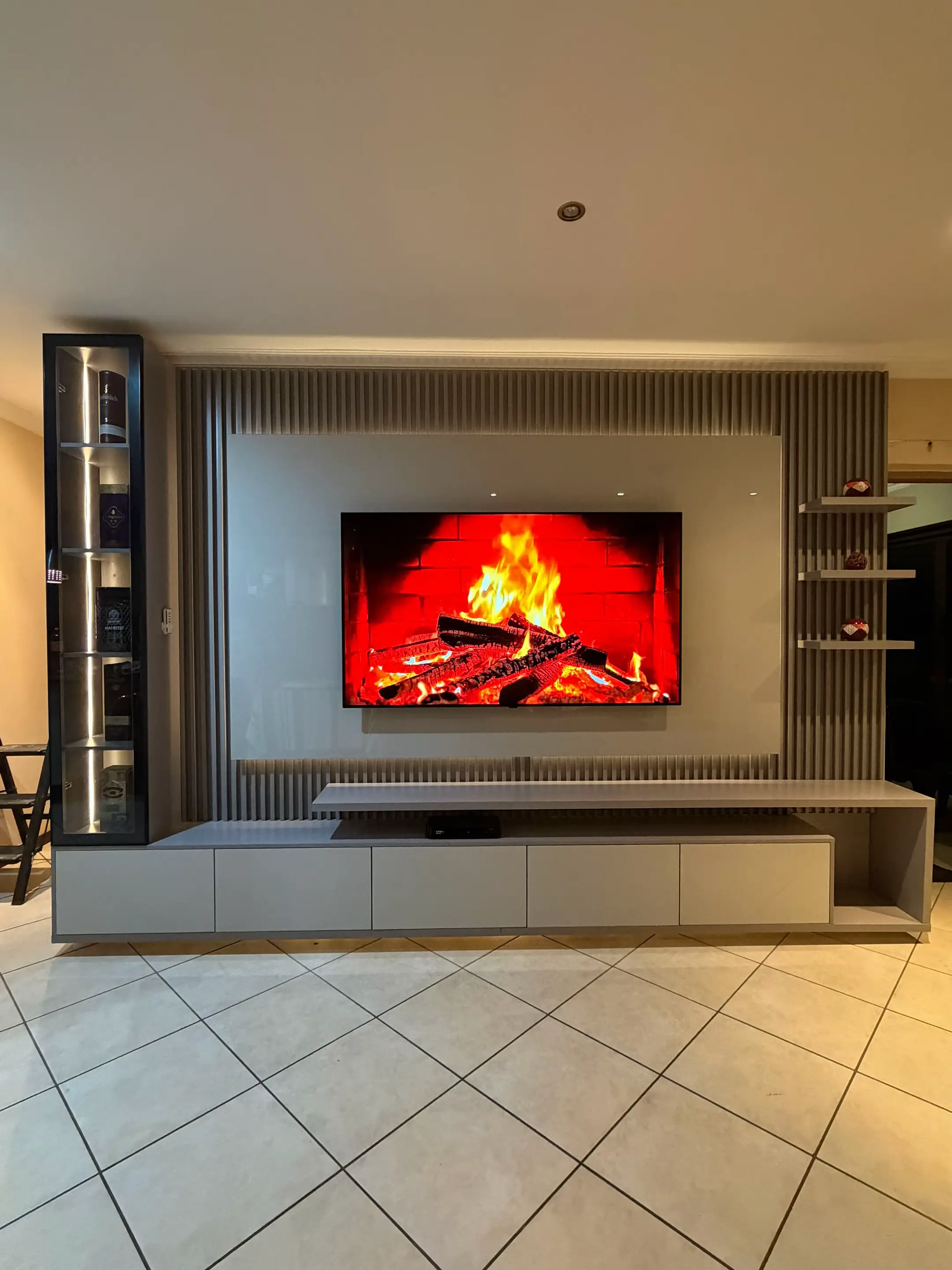 Custom TV walls, kitchens, wardrobes, bars and office furniture. We build everyt