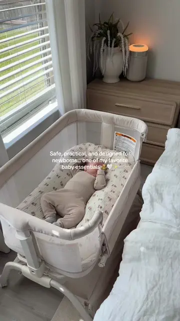 Breathable mesh sides, adjustable height, a waterproof mattress, and storage und