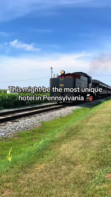 Sleep inside a real train car at the Red Caboose Motel! 🚂 From themed train roo