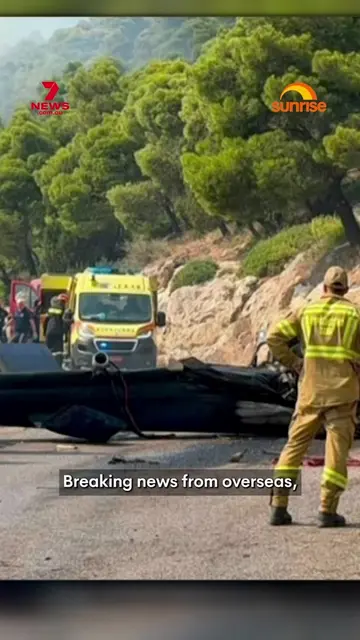 Two firefighting helicopters have collided in Greece while helping to control a 