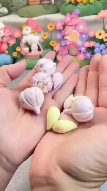 4 hours of sculpting, painting, and patience for this handful of tiny garlics! �