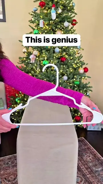 Turn a simple ironing board into the perfect gift wrapping station for the holid