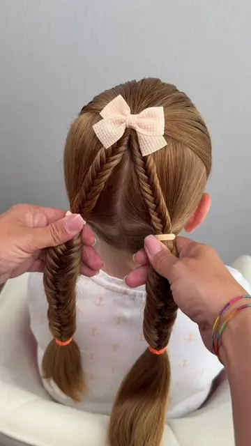 Double fishtail braids = twice the cuteness. 🎀  Save this hairstyle for your ne