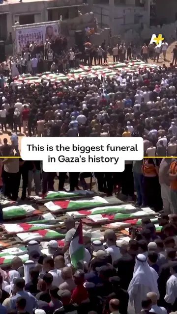 This mass funeral is taking place in Gaza for 112 people from 2 families killed 